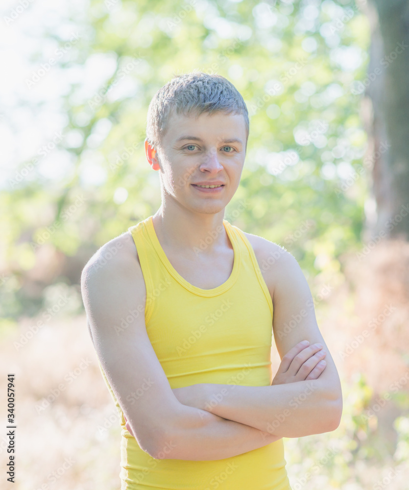 Portrait of a young man in the forest, close-up Portrait of a young man in the forest, close-up