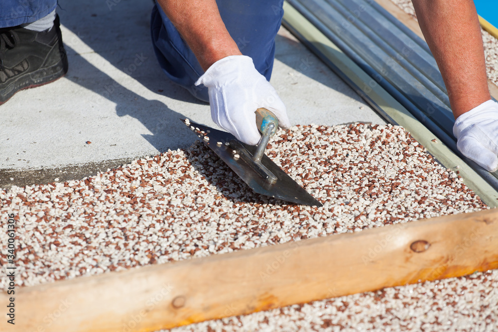 Laying the floor around the outdoor pool.
