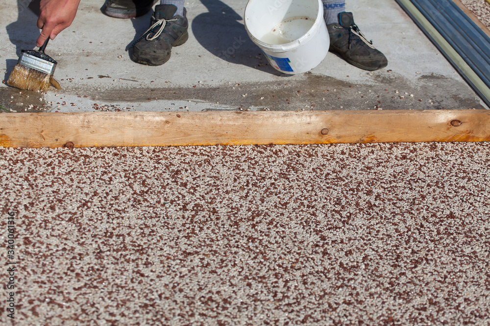 Laying the floor around the outdoor pool.
