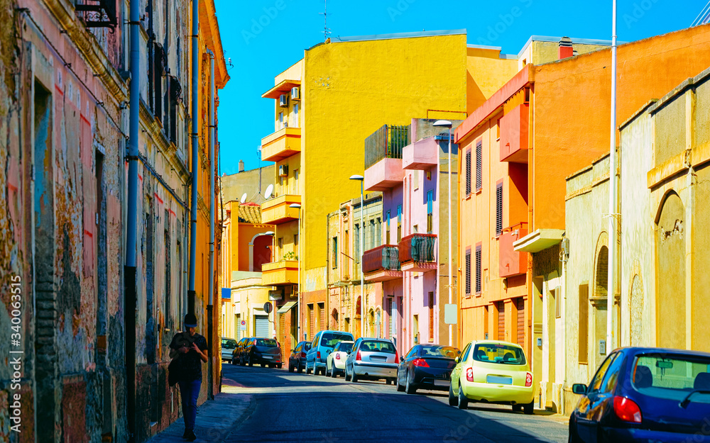 Street view on Road with car parked in Cagliari reflex