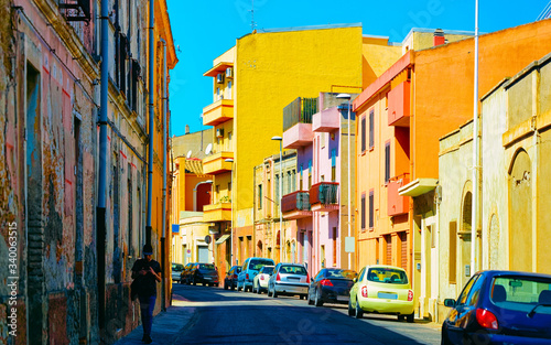 Street view on Road with car parked in Cagliari reflex