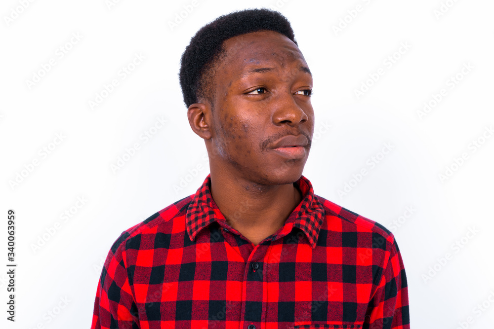 Young handsome African man against white background Young handsome African man against white background