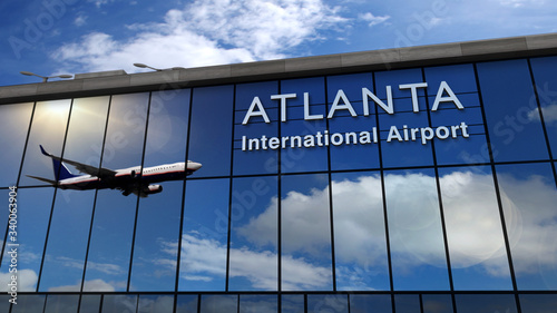 Quadro em tela Airplane landing at Atlanta mirrored in terminal