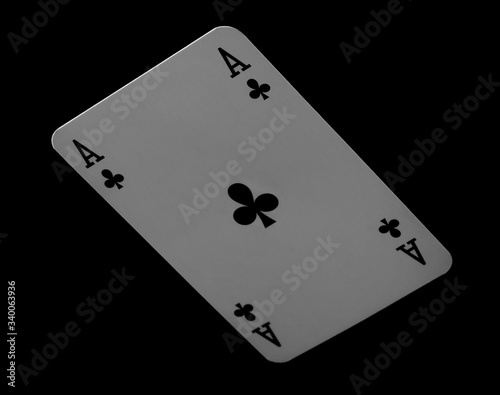 Ace of clubs playing card for poker, gambling and casinos, isolated on black background with clipping path
