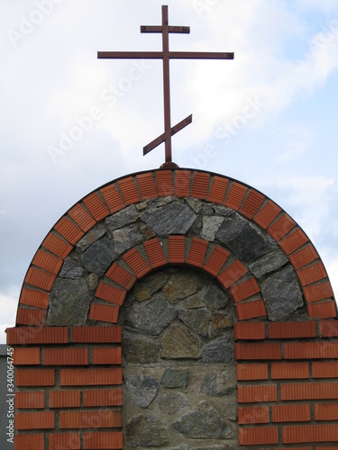 cross on the wall of a church