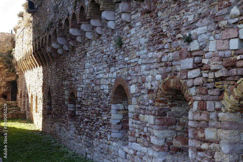Assisi, Italy - 11/30/2019: Exterior and interior of the medieval major fortress Assisi, Italy - 11/30/2019: Exterior and interior of the medieval major fortress