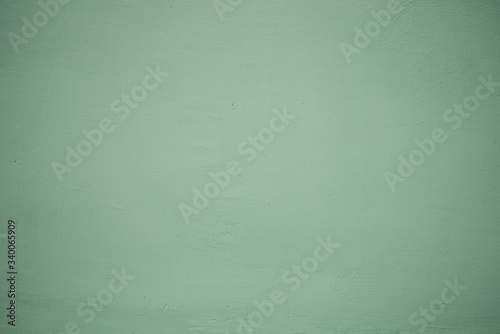 Green wall texture for background use. Pastel colors.