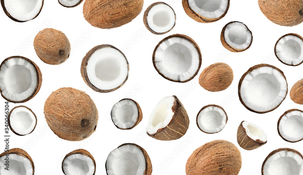 Set with ripe coconuts on white background