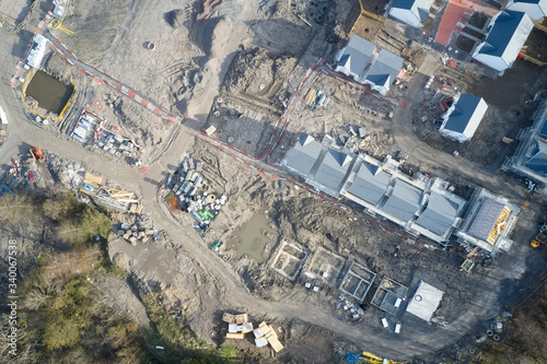 Construction building site aerial view materials pipes machinery equipment