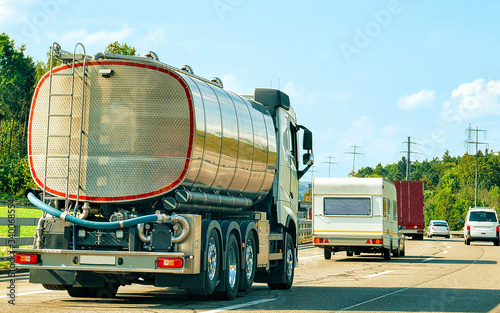 Tanker storage vessel on road in canton Geneva of Switzerland reflex