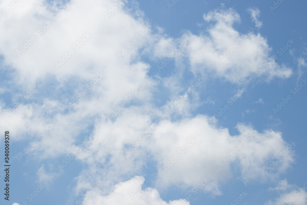 Blue sky with white soft clouds background Blue sky with white soft clouds background