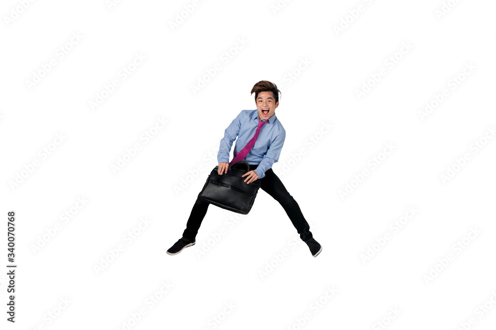 Businessman dancing with his briefcase in studio Businessman dancing with his briefcase in studio