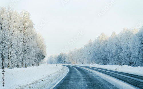 Winter road and a Snowy Forest at Cold Finland reflex