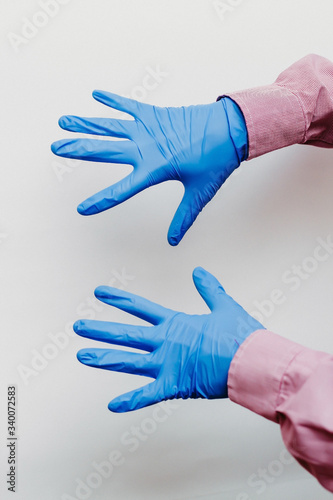 The guy puts on medical gloves