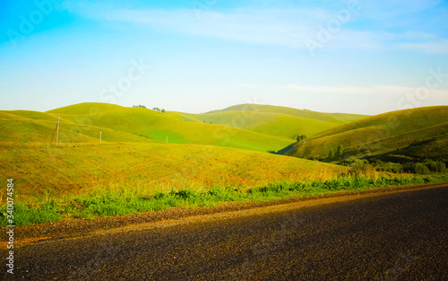 Empty Road and Nature of countryside with green hills reflex