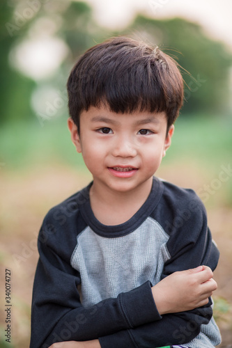 Thai children and nature blur background.