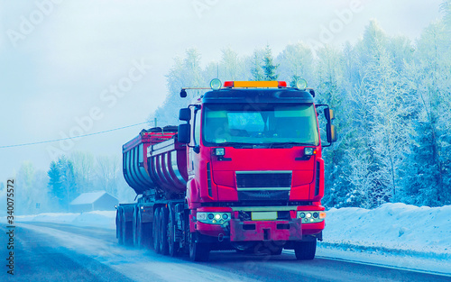 Truck on Snow Road at winter Finland Lapland reflex