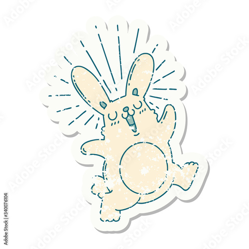 grunge sticker of tattoo style prancing rabbit