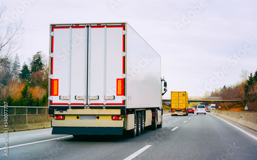 Trucks in road Trucker on highway Lorry doing logistics work reflex