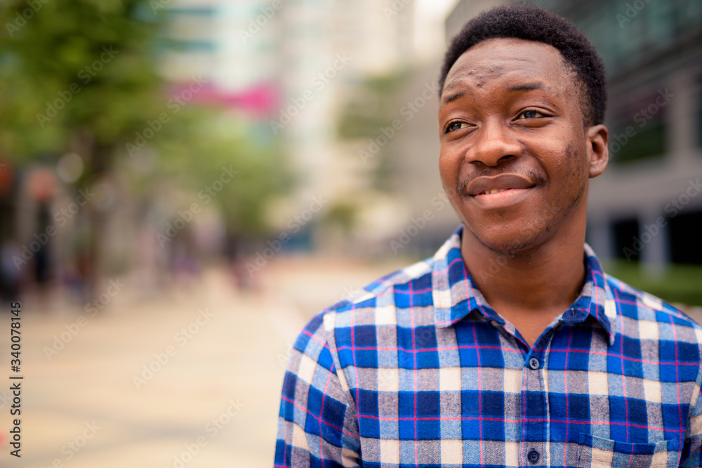 Young handsome African man exploring the city Young handsome African man exploring the city