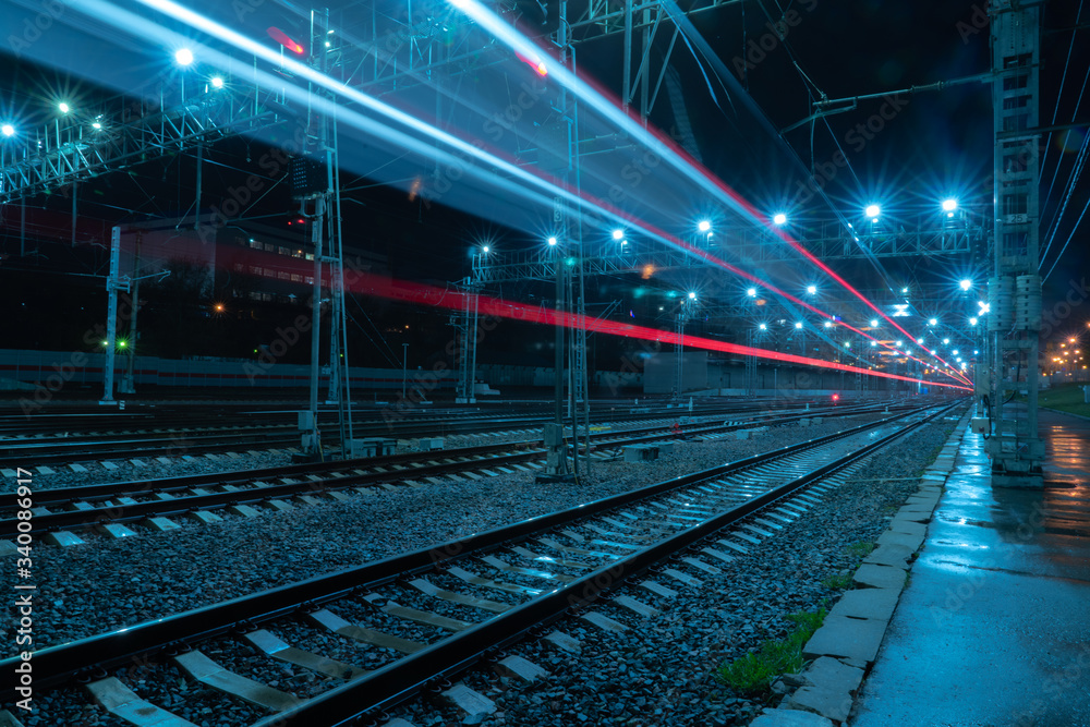 Long-exposure photograph night rail way .Moscow Long-exposure photograph night rail way .Moscow