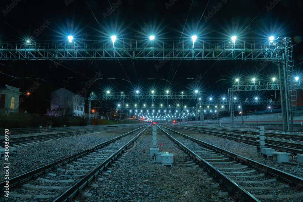 Long-exposure photograph night rail way .Moscow Long-exposure photograph night rail way .Moscow