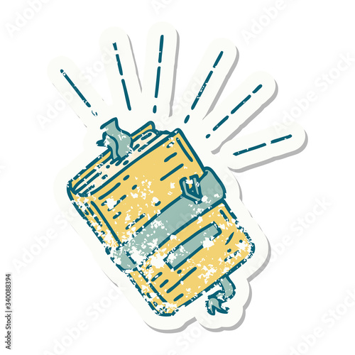 grunge sticker of tattoo style old bound notebook