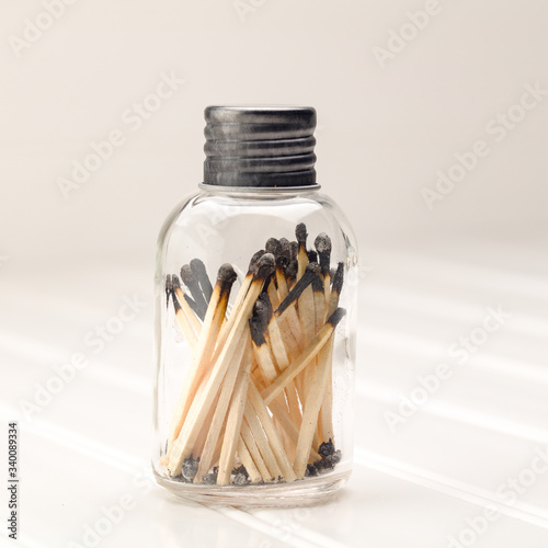 jar with burnt matches