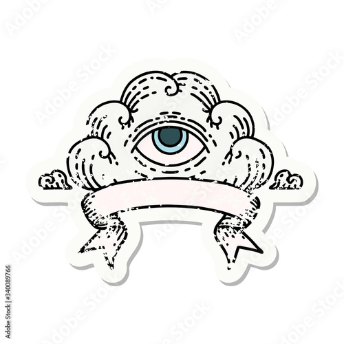 grunge sticker with banner of an all seeing eye cloud