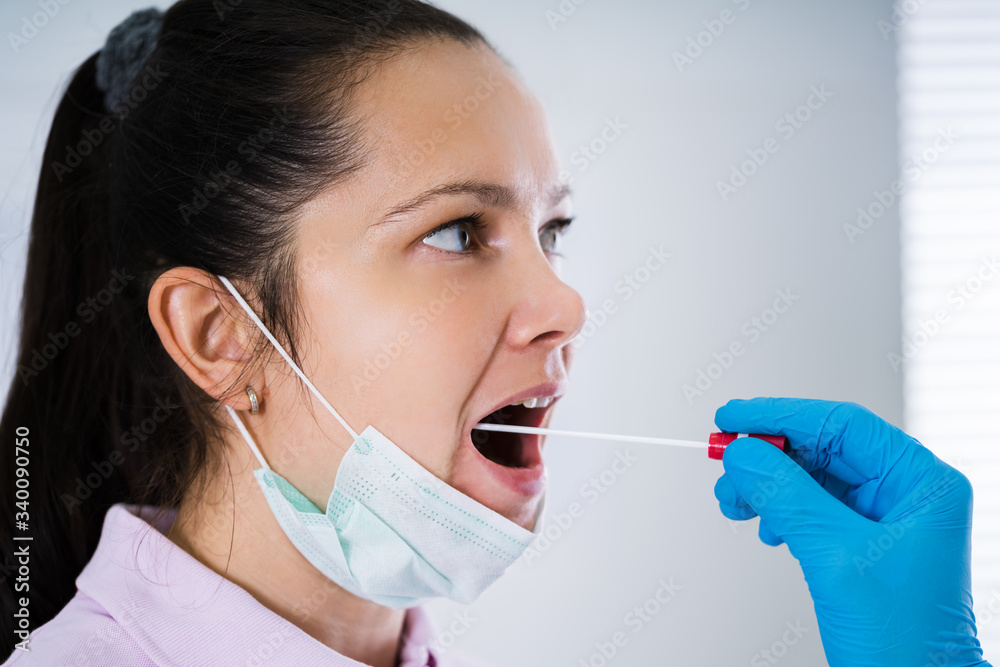Doctor Taking Mouth Fluid Swab Sample Doctor Taking Mouth Fluid Swab Sample