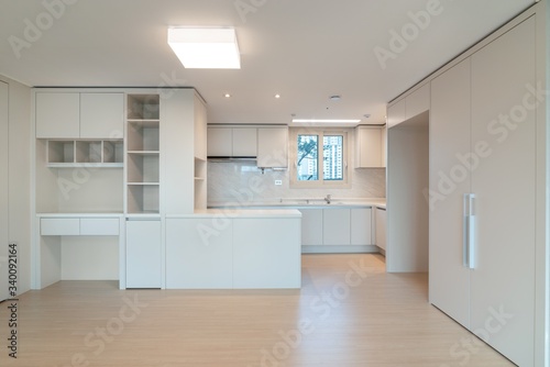 Interior of an empty kitchen in a new apartment.  New apartment interior in South Korea. © sunstock