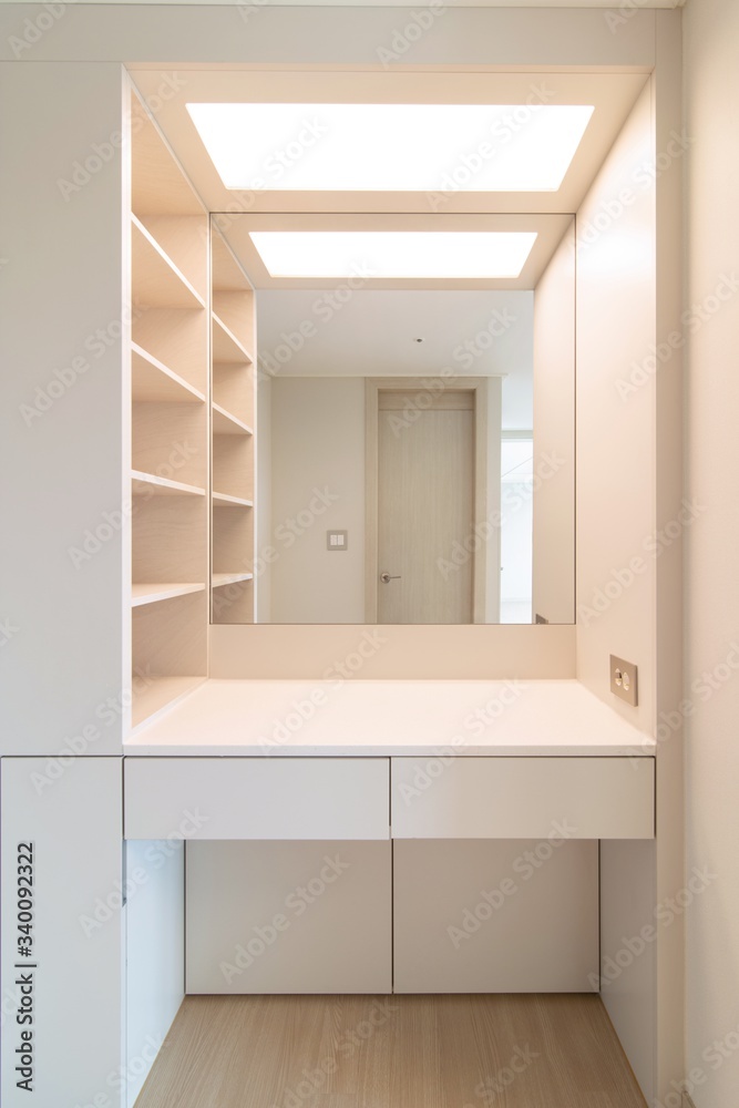 Interior of a dressing table space in a new apartment. New apartment interior in South Korea. Built in dressing table. Interior of a dressing table space in a new apartment. New apartment interior in South Korea. Built in dressing table.