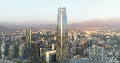 Aerial view of the highest skyscraper in Santiago de Chile during sunset. Sky Costanera. 4K. photo