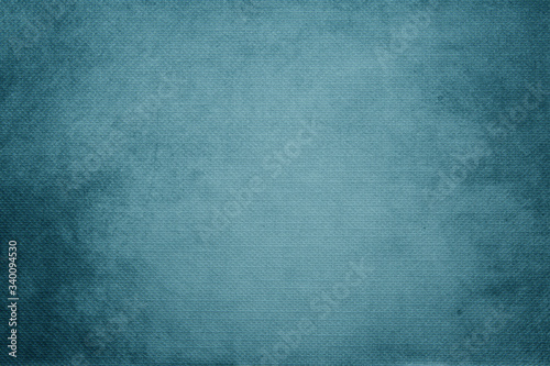 Cyan blue abstract hessian or sackcloth fabric or hemp sack texture background. Wall of artistic wale linen canvas seamless.