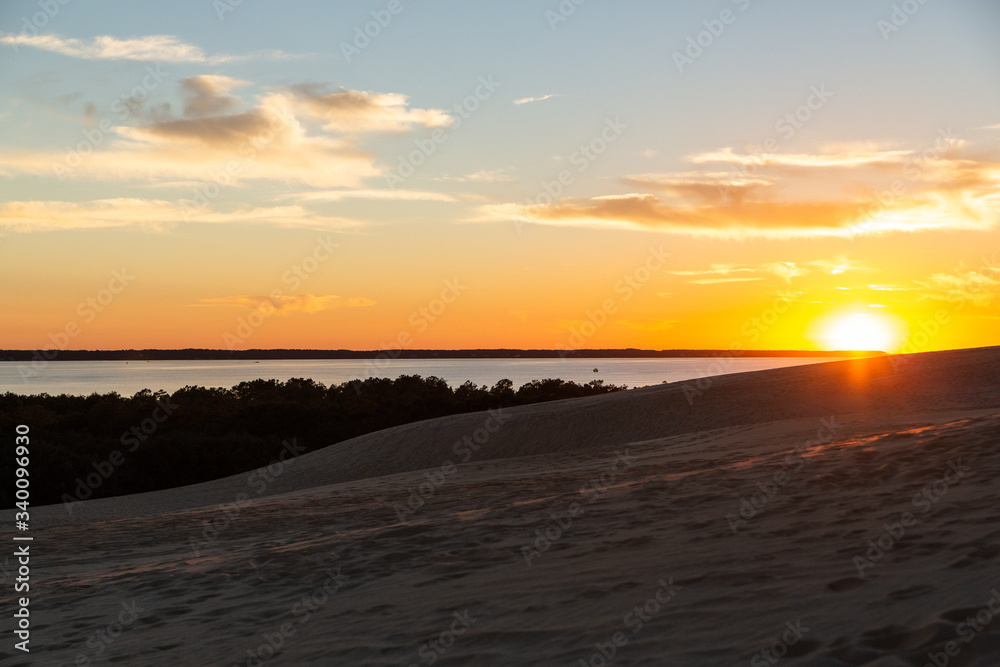 Sunset Over the Sound with Dunes and Wild Shrubs at Corolla, North Carolina