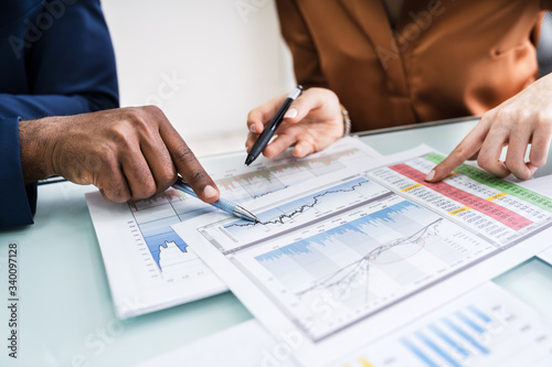 Businesswoman Writing On Graph