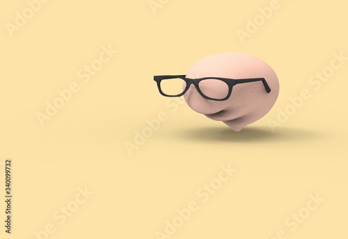Pink brain with glasses on a yellow background