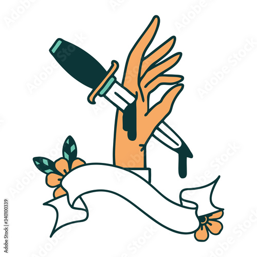 tattoo with banner of a dagger in the hand