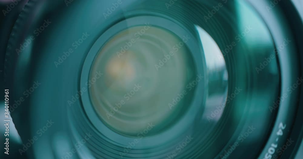 Focusing DSLR camera lens - close up macro shot of internal lens elements & glass