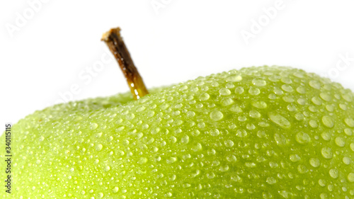 Foto Close up fresh green Apple granny smith isolated on white background with water