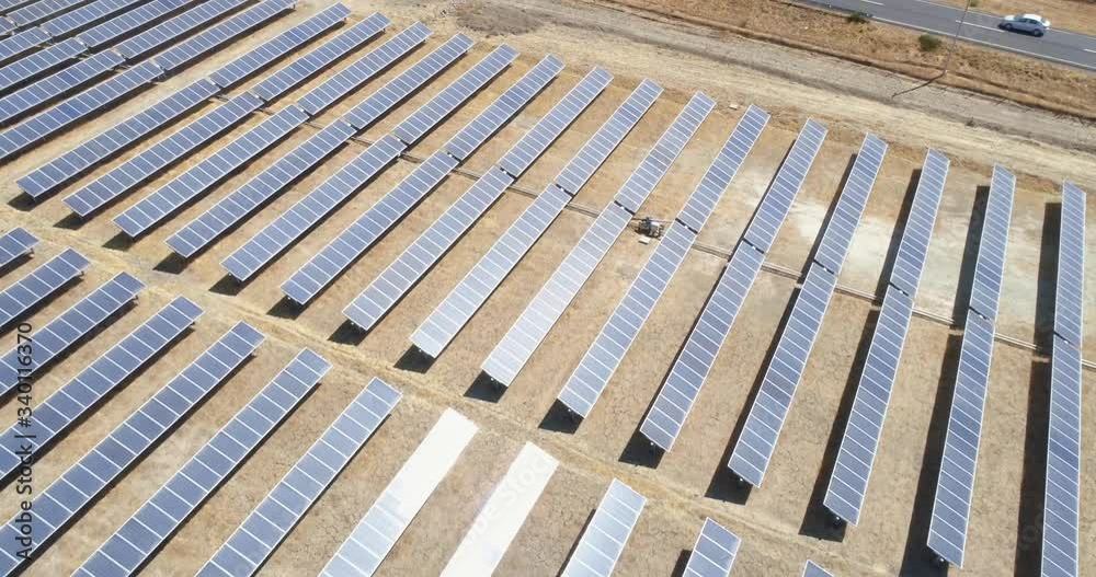 Rows of Solar panels in Solar Farm in rural Chile. Solar energy farm. High angle, elevated view of solar panels on an energy farm. 4K. Rows of Solar panels in Solar Farm in rural Chile. Solar energy farm. High angle, elevated view of solar panels on an energy farm. 4K.