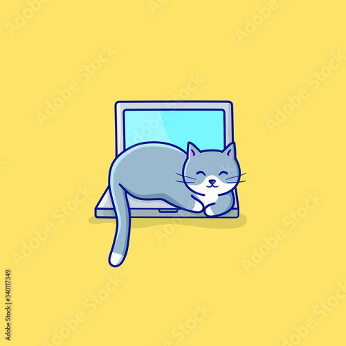Cat. Cute kitty on keayboard of notebook and relaxing photo