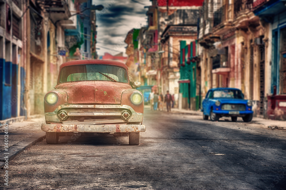 old classic cars parked on a street in Havana, cuba