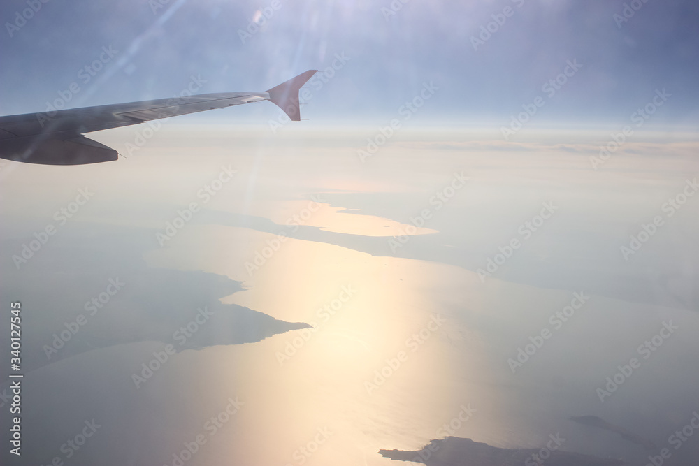 View from the plane on a sunny day View from the plane on a sunny day