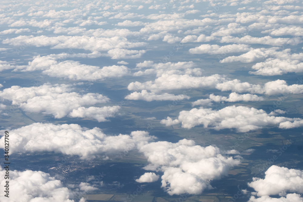 Beautiful clouds in the sky. View from the plane Beautiful clouds in the sky. View from the plane