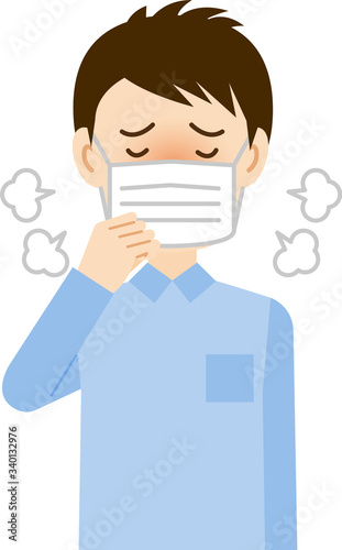風邪をひいている若い男性