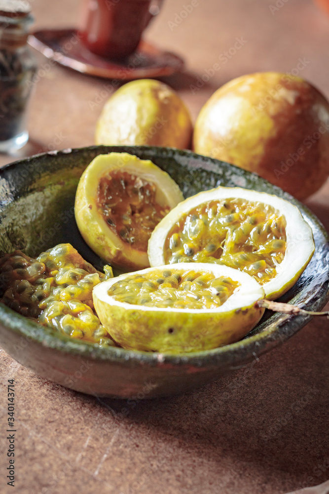 Passion fruit still life on a wooden background. Healthy, organic food concept