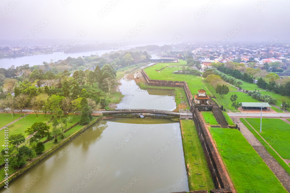 Wonderful view of the “ Meridian Gate Hue “ to the Imperial City with the Purple Forbidden City within the Citadel in Hue, Vietnam. Imperial Royal Palace of Nguyen dynasty in Hue. Ngan gate