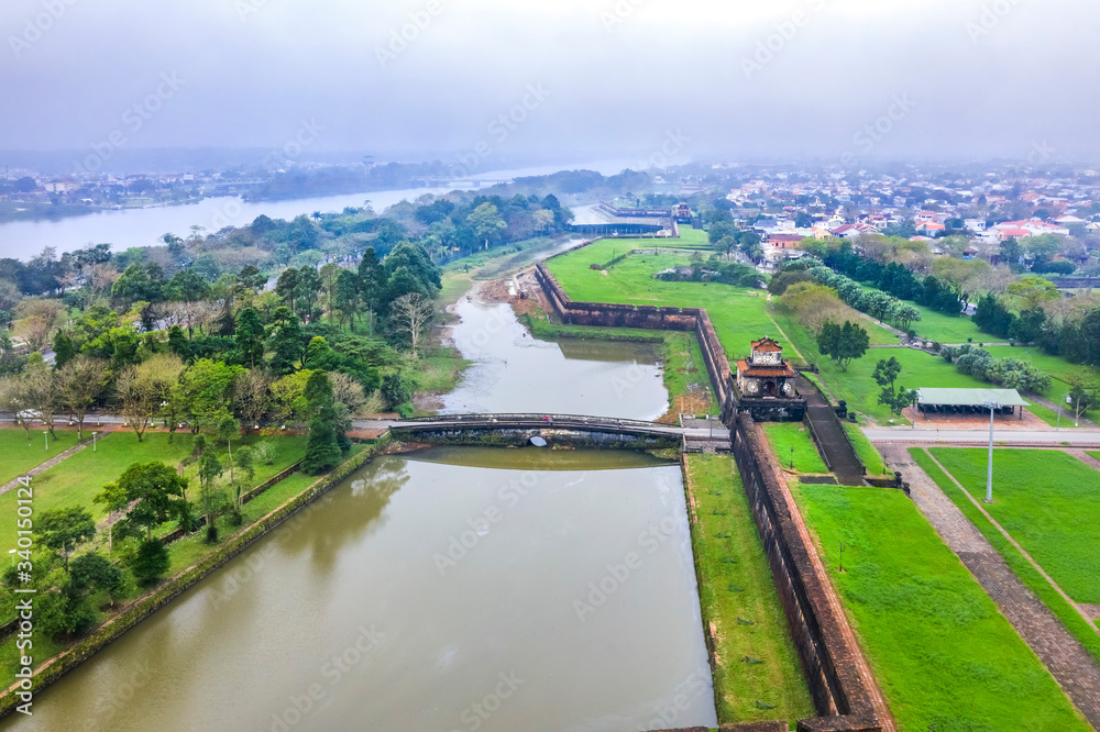 Wonderful view of the “ Meridian Gate Hue “ to the Imperial City with the Purple Forbidden City within the Citadel in Hue, Vietnam. Imperial Royal Palace of Nguyen dynasty in Hue. Ngan gate