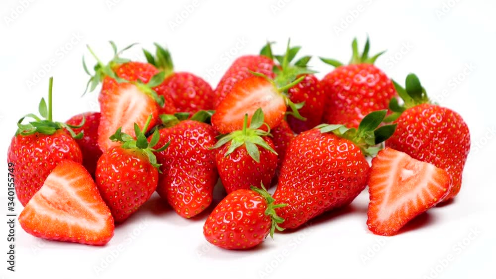heap of strawberries fruits isolated on white background heap of strawberries fruits isolated on white background